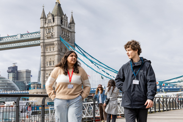 Two students walking on the London campus.